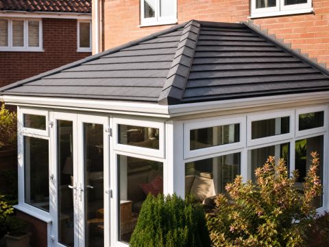 Conservatory with new solid tiled warm roof replacement — Midlands